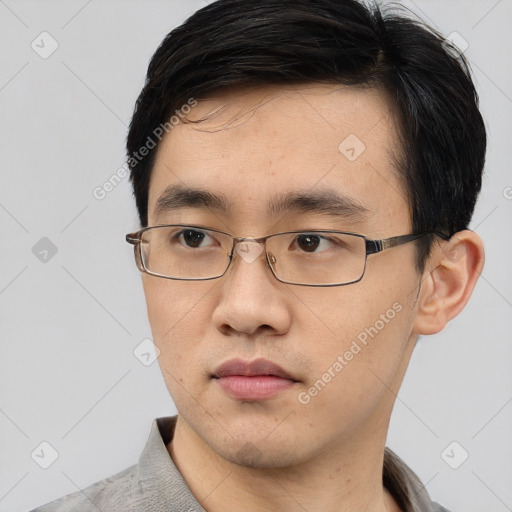Neutral asian young-adult male with short  black hair and brown eyes