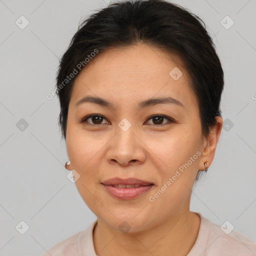 Joyful asian young-adult female with short  brown hair and brown eyes