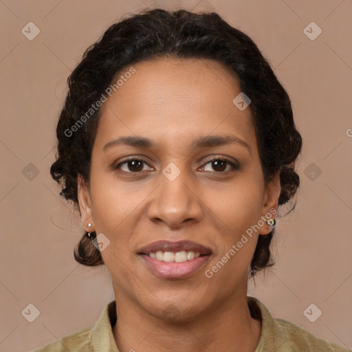 Joyful latino adult female with medium  brown hair and brown eyes