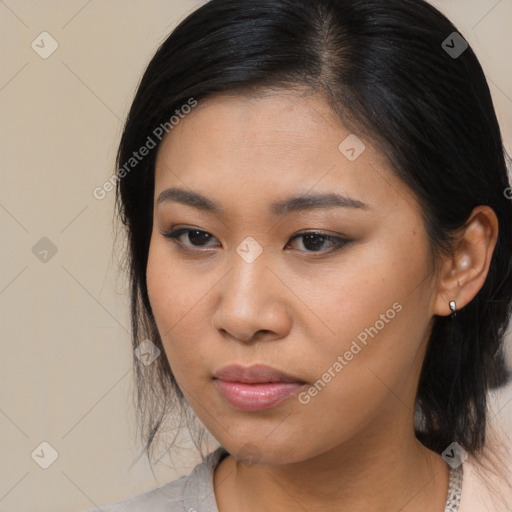 Neutral asian young-adult female with medium  brown hair and brown eyes