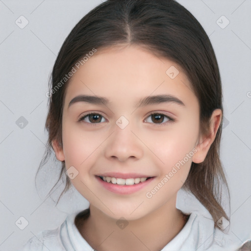 Joyful white child female with medium  brown hair and brown eyes