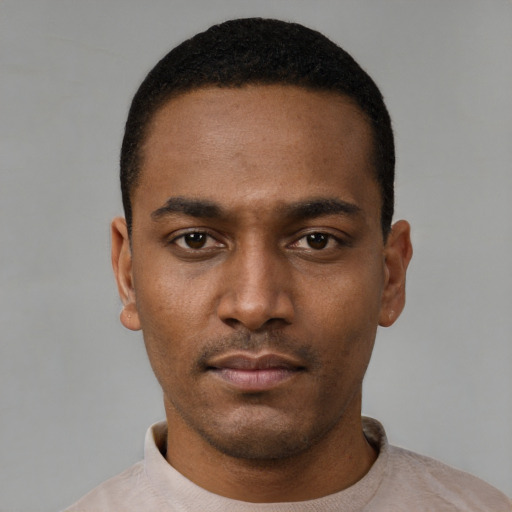 Neutral black young-adult male with short  black hair and brown eyes