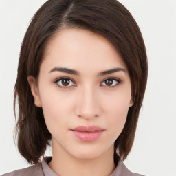 Neutral white young-adult female with medium  brown hair and brown eyes