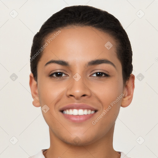 Joyful latino young-adult female with short  brown hair and brown eyes