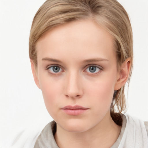 Neutral white young-adult female with medium  brown hair and blue eyes