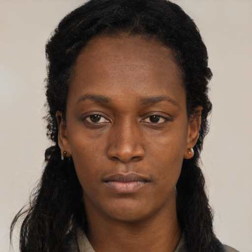 Neutral black young-adult female with long  black hair and brown eyes