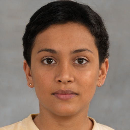 Neutral latino young-adult female with short  brown hair and brown eyes