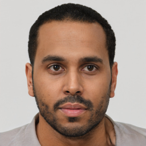 Neutral black young-adult male with short  black hair and brown eyes