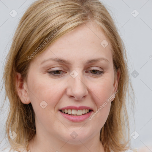 Joyful white young-adult female with medium  brown hair and blue eyes