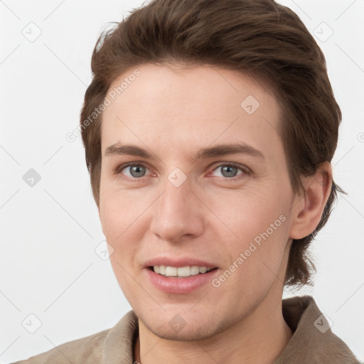 Joyful white young-adult female with short  brown hair and grey eyes