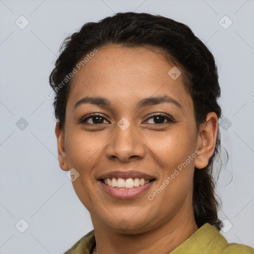 Joyful latino young-adult female with short  brown hair and brown eyes