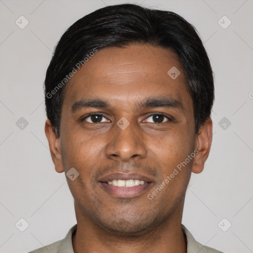 Joyful latino young-adult male with short  black hair and brown eyes