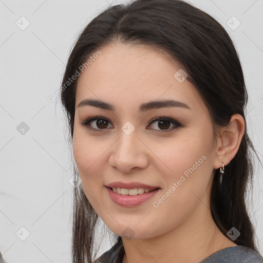 Joyful white young-adult female with long  brown hair and brown eyes