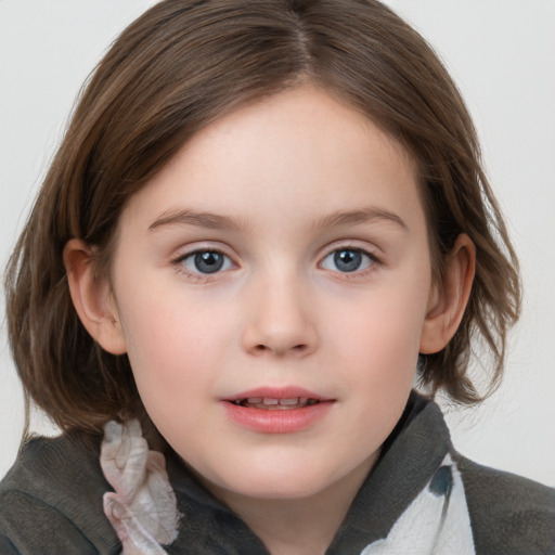 Joyful white child female with medium  brown hair and grey eyes