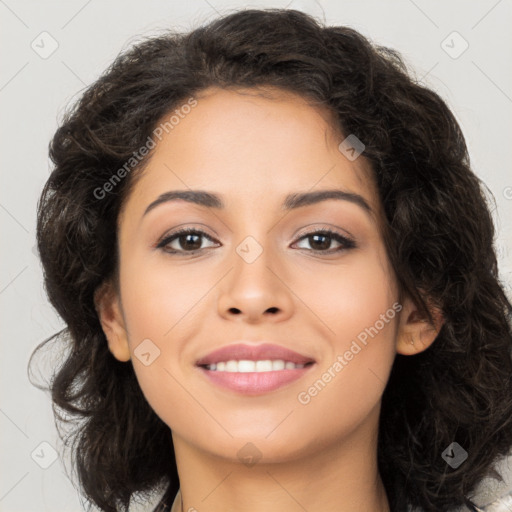 Joyful latino young-adult female with long  brown hair and brown eyes