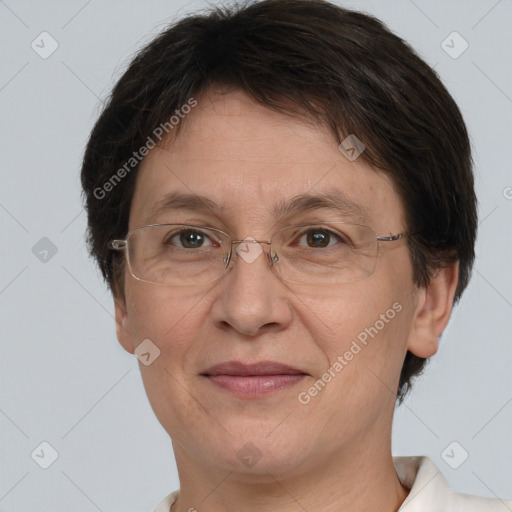 Joyful white adult female with short  brown hair and brown eyes