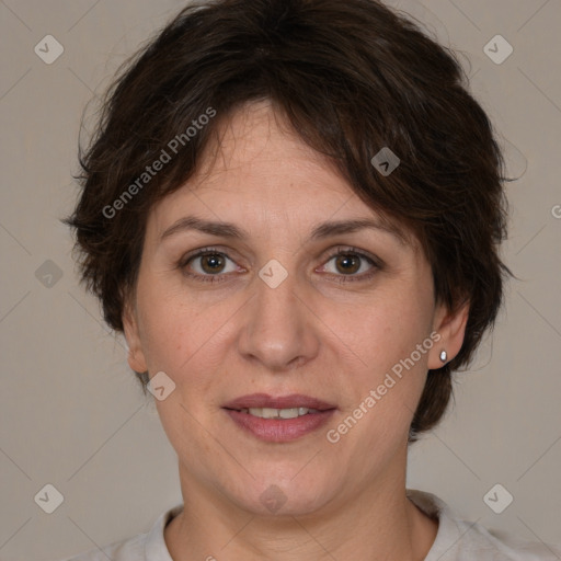 Joyful white adult female with short  brown hair and brown eyes