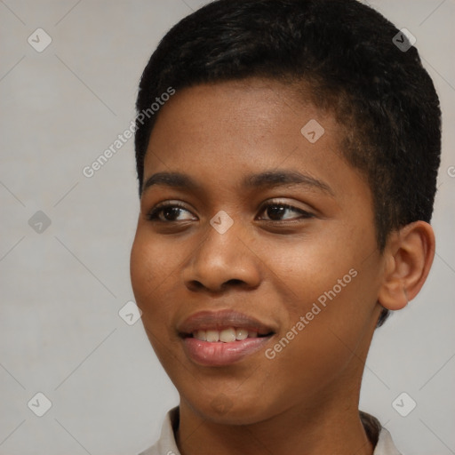 Joyful black young-adult female with short  black hair and brown eyes