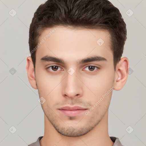 Neutral white young-adult male with short  brown hair and brown eyes