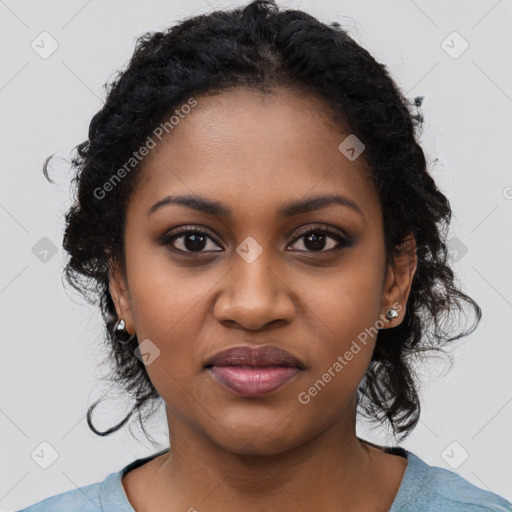 Joyful black young-adult female with medium  black hair and brown eyes