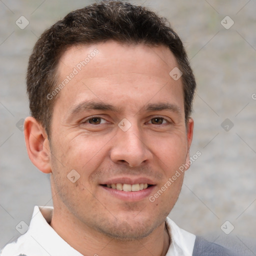 Joyful white adult male with short  brown hair and brown eyes