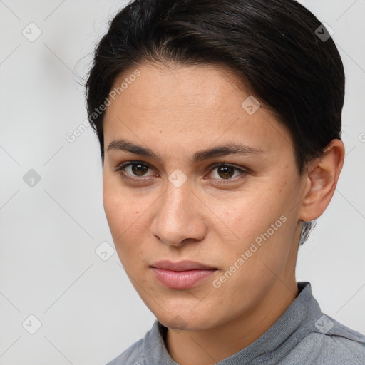 Joyful white young-adult female with short  brown hair and brown eyes