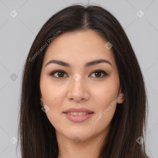 Joyful latino young-adult female with long  brown hair and brown eyes