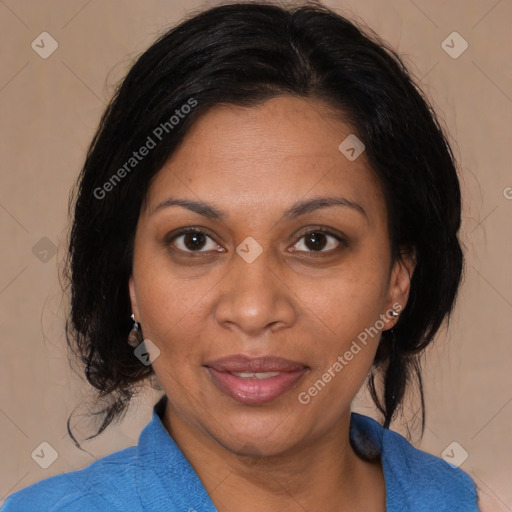 Joyful black adult female with medium  brown hair and brown eyes