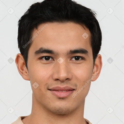 Joyful latino young-adult male with short  brown hair and brown eyes