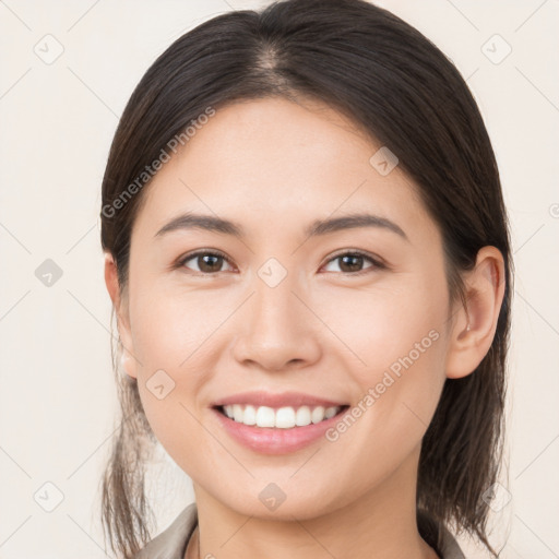 Joyful white young-adult female with medium  brown hair and brown eyes