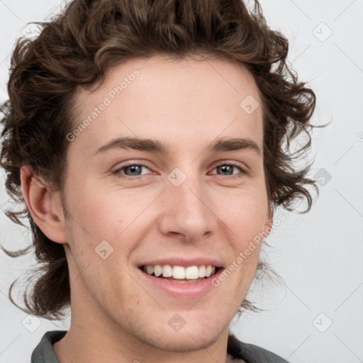 Joyful white young-adult male with medium  brown hair and brown eyes