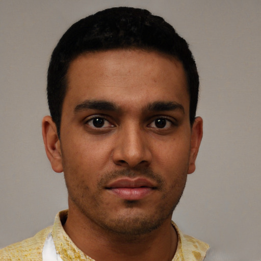 Neutral latino young-adult male with short  brown hair and brown eyes