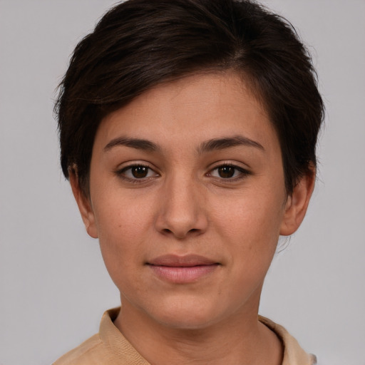 Joyful asian young-adult female with short  brown hair and brown eyes