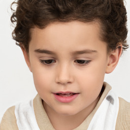 Joyful white child male with short  brown hair and brown eyes