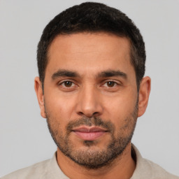 Neutral white young-adult male with short  black hair and brown eyes