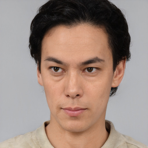 Neutral latino young-adult male with short  brown hair and brown eyes