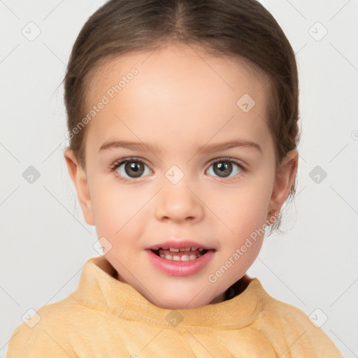 Joyful white child female with short  brown hair and brown eyes