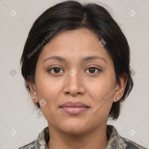 Joyful latino young-adult female with medium  brown hair and brown eyes