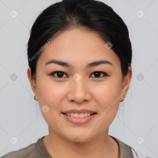 Joyful asian young-adult female with medium  brown hair and brown eyes