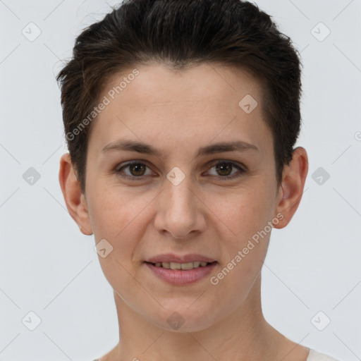 Joyful white young-adult female with short  brown hair and brown eyes