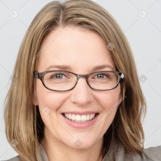 Joyful white young-adult female with medium  brown hair and blue eyes