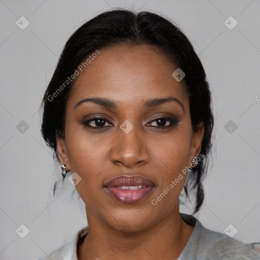 Joyful black young-adult female with medium  black hair and brown eyes