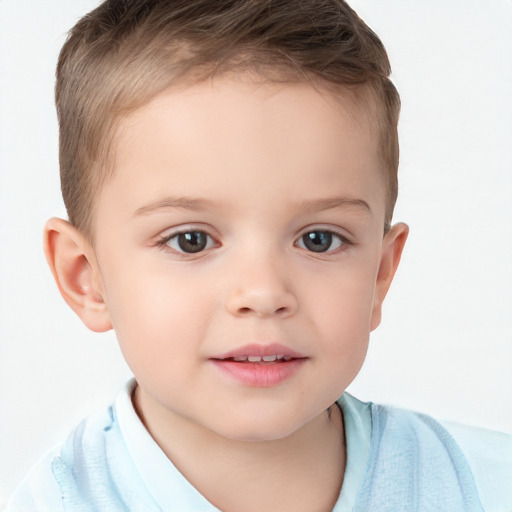 Joyful white child male with short  brown hair and brown eyes