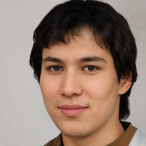 Neutral white young-adult male with medium  brown hair and brown eyes