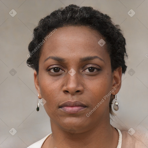 Neutral black young-adult female with short  brown hair and brown eyes