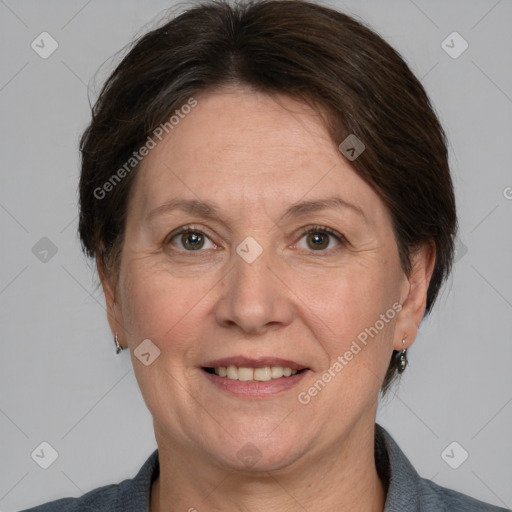 Joyful white adult female with medium  brown hair and grey eyes