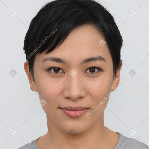 Joyful asian young-adult female with short  black hair and brown eyes