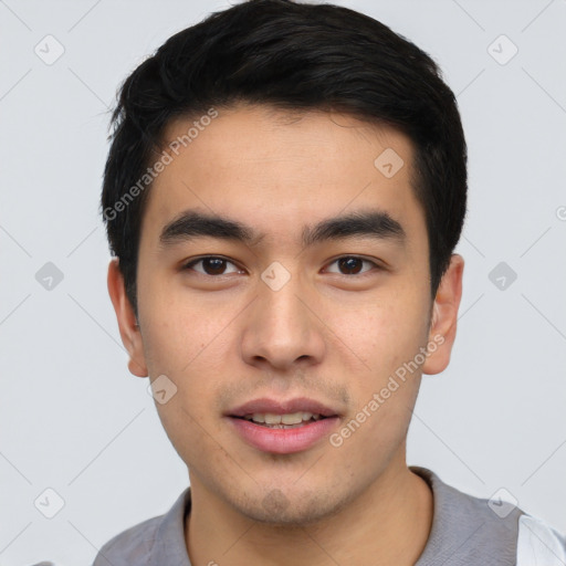 Joyful asian young-adult male with short  black hair and brown eyes