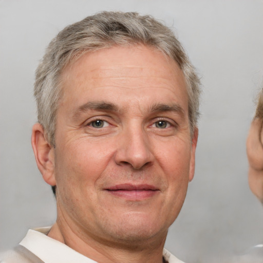 Neutral white middle-aged male with short  brown hair and brown eyes