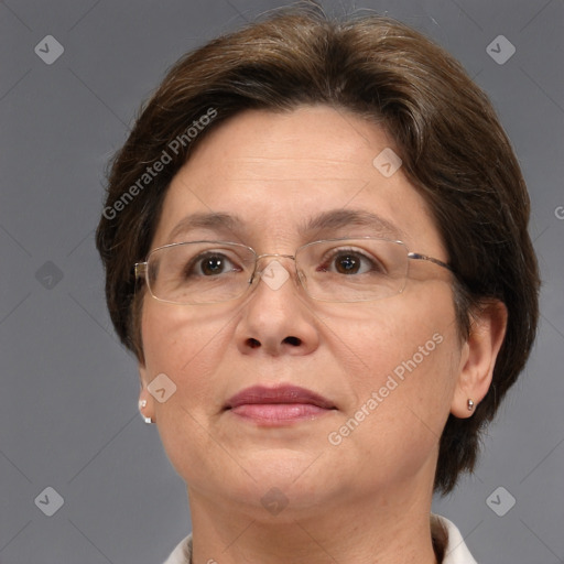 Joyful white adult female with short  brown hair and brown eyes